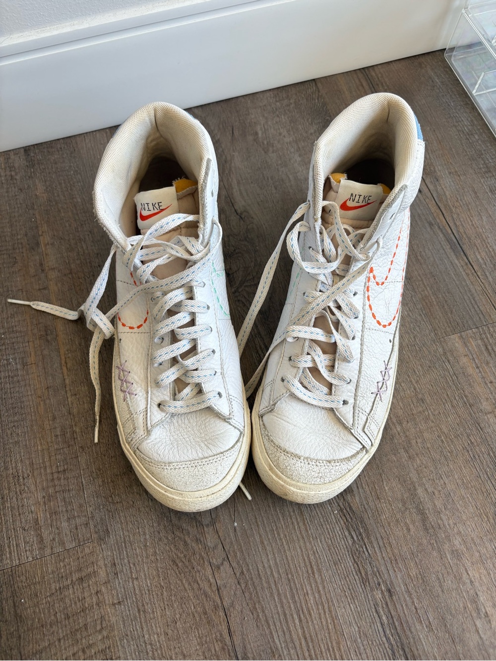 Nike Women’s White High-Top Sneakers with Multicolor Embroidered Swoosh